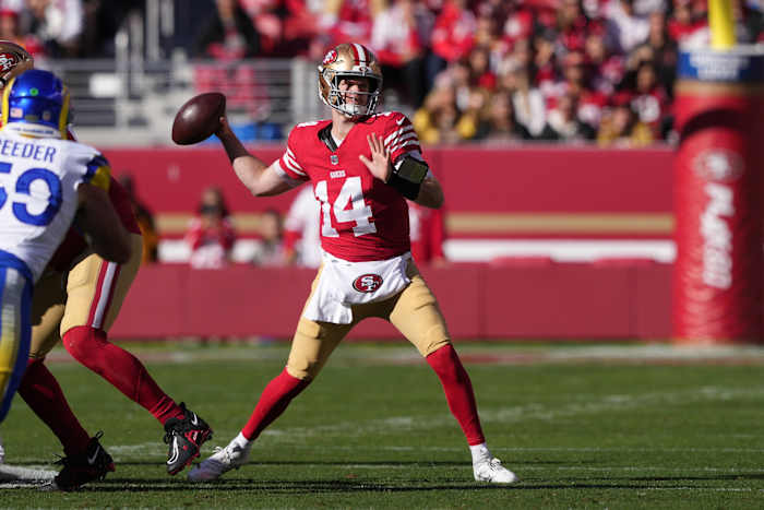 Jan 7, 2024; Santa Clara, California, USA; San Francisco 49ers quarterback Sam Darnold (14) throws a pass against the Los Angeles Rams during the first quarter at Levi's Stadium.